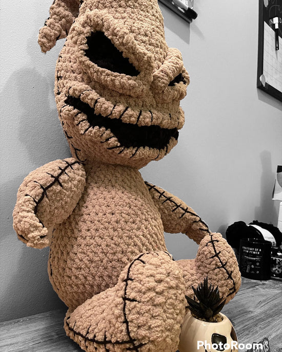 Crocheted Oogie Boogie from nightmare before Christmas perfect addition to any NBC collection! Measures 22 inches tall and it’s made with chenille yarn so he’s super soft and perfect for cuddles ! 